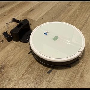 Yeedi Vac robo-vacuum in box. Used 2 times. Pets present. Cleaned and sanitized
